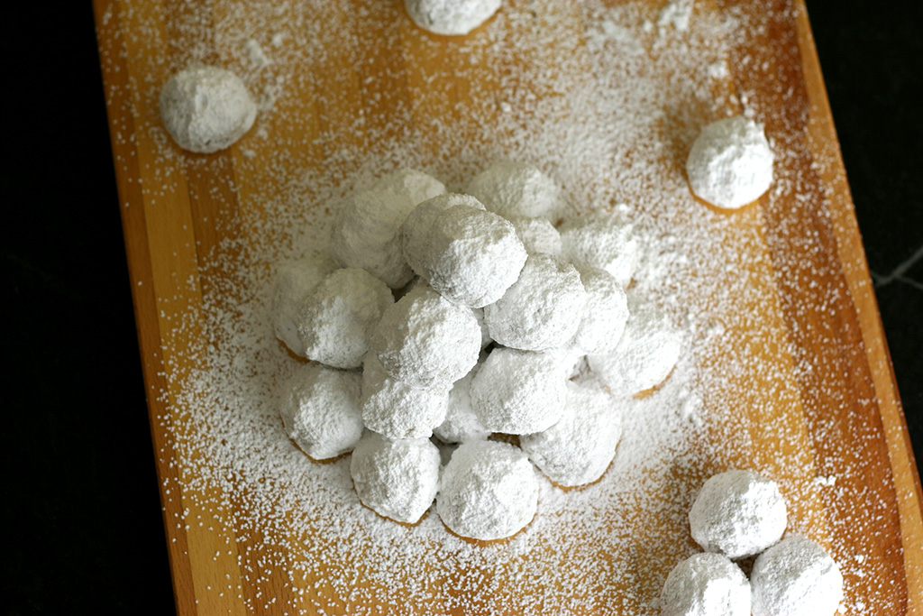 Russian Tea Cakes on a cutting board