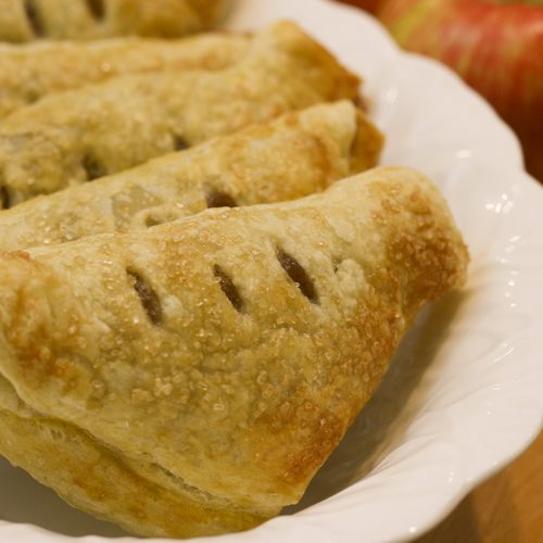 Apple Turnovers lined up in a bowl